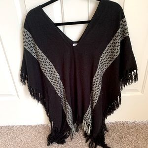 One size fits all black poncho from Francesca’s